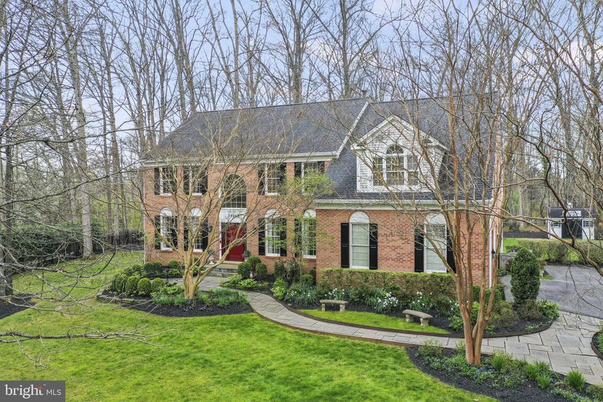 Welcome to your dream home nestled in the heart of the sought-after Glen Hills neighborhood, offering serene living on a wooded 1-acre lot. This stunning 6-bedroom residence boasts an array of desirable features, perfect for both comfortable living and entertaining.

As you step inside, you're greeted by the warmth of hardwood floors throughout the first level, leading you to a meticulously renovated kitchen equipped with top-of-the-line stainless steel appliances, 2 beverage refrigerators,  coffee station, sub zero fridge and gorgeous quartz countertops! The first floor also boasts a convenient en suite guest room, providing luxurious accommodation for visitors.

Enjoy the tranquility of nature from the comfort of your own home with a screened porch and deck, ideal for al fresco dining or simply unwinding amidst the lush surroundings. Enter to this oasis from French doors off the family room or dining room! 

For those who love to curl up with a good book, the first-floor library with built-ins offers a cozy retreat. Upstairs, discover four additional bedrooms, including a luxurious primary suite complete with a den/sitting room and private gym—a haven for relaxation and rejuvenation.

Renovated bathrooms throughout ensure modern convenience and style, while the bedroom in the basement provides versatile living options. Whether you're hosting guests or seeking a quiet sanctuary, this home offers the perfect blend of comfort, elegance, and natural beauty. Don't miss the opportunity to make this exceptional property yours. Schedule your showing today and experience the epitome of luxurious living in Rockville.