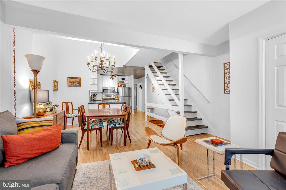 Price Adjustment Made! Welcome to this charming duplex located in the heart of Philadelphia’s sought-after Queen Village neighborhood. This property offers a fantastic blend of modern updates and classic character, featuring two well-appointed units. The upper unit boasts 3 spacious bedrooms (one being used as an office) and 2 full baths, both of which have been tastefully updated. The primary bedroom suite boasts a private sanctuary, complete with an en-suite bathroom and a walk-in cedar closet. For added convenience, the suite also includes a dedicated laundry area. The standout feature of this unit is the dramatic mezzanine dining area, flooded with natural light from a skylight, creating a bright and airy atmosphere perfect for entertaining or everyday meals. The open layout also includes a contemporary kitchen and living spaces, all enhanced by beautiful hardwood floors throughout. The lower unit is a cozy 2-bedroom, 1-bathroom apartment located on the first floor, offering privacy and comfort with kitchen and bath. The property is equipped with separate utilities for electric and gas, providing convenience and efficiency for both units. This duplex offers exceptional outdoor living spaces for both units. The upper unit features a large roof deck that provides stunning views of the Philadelphia skyline, making it the perfect spot to relax or entertain while enjoying the cityscape. The lower unit enjoys its own private rear patio, offering a peaceful outdoor retreat ideal for dining al fresco, or simply unwinding in a quiet, enclosed space. Additionally, both units benefit from a spacious, unfinished basement that may serve as a convenient laundry area and provides ample storage for all your belongings. Whether you need space for seasonal items, extra furniture, or simply prefer having a dedicated area for laundry, the basement offers plenty of room for organization and convenience. Located just steps from some of Philadelphia’s best cafes, restaurants, and local shops, this duplex offers the perfect mix of urban living and neighborhood charm. Whether you're looking to occupy one unit and rent the other, or seeking a versatile investment opportunity, this property is not to be missed. Schedule your showing today and discover the potential of this well-maintained gem in one of the city's most vibrant neighborhoods. One unit will be vacant at closing.