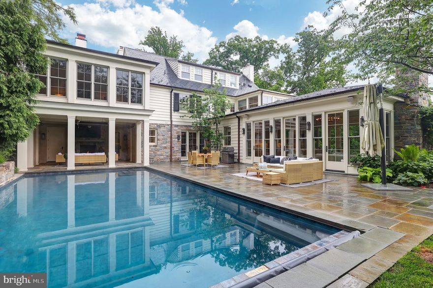 New Price! Exclusive Offering in Wesley Heights — Step into a realm of sophistication and privacy with this prestigious 7000 sq ft residence, discreetly nestled above some of Washington's most sought-after streets, the corner of Cathedral and Foxhall. Renovated to perfection in 2014 by the acclaimed architect Dale Overmyer, this home unfolds over four levels of unparalleled luxury living.
Adjacent to the tranquil Battery Kemble Park, the property’s serene setting is enhanced by masterfully designed landscapes and captivating sunset vistas that promise an enchanting atmosphere. The main level is thoughtfully designed with sweeping views towards the park, featuring a majestic eat-in kitchen and family room. This central gathering space boasts 15-foot ceilings and triple French doors, flooding the area with light and inviting ambiance.
Further enriching the first floor are a charming library, an elegant dining room, a spacious living room, a dedicated laundry room, and a chic pool cabana, all designed to cater to grand entertaining and intimate gatherings.
The residence's private quarters are no less impressive. The second floor features a lavish primary suite with dual dressing rooms, an additional laundry facility, a luxurious bathroom, and a sunlit bedroom with stunning expansive views.
The lower level is a haven for leisure and comfort, including a large recreation room, a nanny suite with a full bathroom, a substantial gym, and a third laundry area.
Outside, the estate offers a seamless blend of indoor and outdoor living with a fireplace-adorned poolside area, exquisitely maintained gardens, a heated saltwater pool, a sports court, and multiple terraces perfect for distinguished hosting and private enjoyment.
Available exclusively by appointment, this home is a sanctuary of elite living awaiting the most discerning buyer.