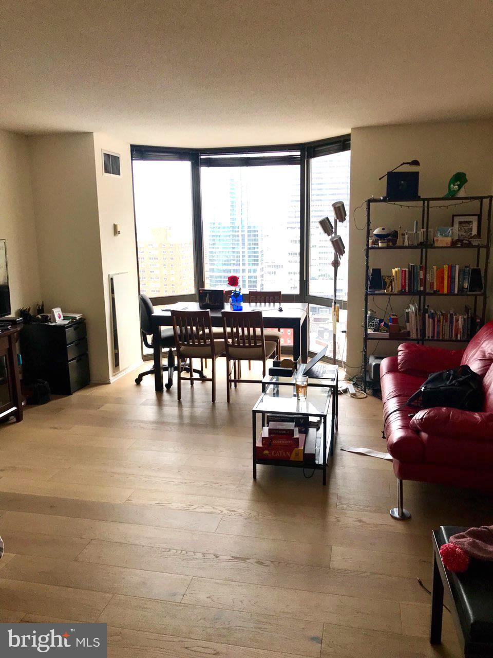 Rare opportunity to combine a two bedroom, two bathroom (1,198 SF) with the adjacent studio (548 SF) to create a three bedroom, three bathroom residence on a high floor of The Wanamaker House. Currently, the two bedroom condo offers an eat-in kitchen, spacious great room, excellent closet space and floor-to-ceiling bay windows in all rooms. The studio also has a floor-to-ceiling bay window. When combined, the studio can easily be converted into a luxurious master suite. Residents of The Wanamaker House enjoy the 24-hour front desk, access to the roof top swimming pool, exercise room, sauna and on-site garage parking for a fee. Located steps from Rittenhouse Square, ranked the 6th best neighborhood in North America by Place Rated Almanac, there are 175 restaurants and 199 retailers within a three block radius of Wanamaker House. It is within close walking distance to the Market Street office corridor, The Avenue of the Arts and University City. Amtrak's 30th Street Station and Philadelphia International Airport is only minutes away. Note: the floor plan shows a proposed layout to combine the two units; currently they are two separate units