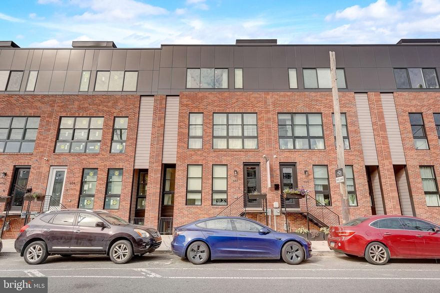 ASK ABOUT OUR $25,000 BUYER CREDIT! Positioned between Fairmount and Northern Liberties is The Residences at Park Avenue, a community of 28 semi-custom 21.5' ultra wide homes scheduled for completion in the Fall of 2022. For a limited time, these homes are available at a pre construction price with opportunities to customize. Statement-making lighting pieces hover proudly as you enter the first floor where you’ll find a bedroom, full bathroom, and bright office area. Wood flooring, designer light fixtures, and strategically placed accent lighting are just a few of the high-end features that adorn these homes. Heading upstairs you will find the open concept floor plan that allows the living and kitchen areas to blend seamlessly together. Exploring every corner of this floor, you will discover convenient features designed for entertaining and everyday life. The kitchen area features a quartz island with optional elegant under-counter lighting and tambour paneling, GE appliances, and soft close cabinetry. To create intimate evenings with family or friends, opt for the built in Sonos speaker system, smart lighting controls to dim the lights, and craft a cocktail at the built-in beverage & wine station. Then open the sliding doors off the living area to your second floor patio to enjoy an evening under the stars, a space perfectly suited for morning pastries and coffee to grilling and cocktails. The third floor bedrooms are bright open spaces that can be upgraded with custom closets and smart lighting systems. Entering the main bedroom you’ll love the spa-like bathroom with finishes thoughtfully selected by professional designers, optional heated floors extending into the shower, and a frameless glass shower. Finally, the fourth level is your outdoor oasis– a 400+ sq ft deck with views of Center City and Northern Liberties. Choose to furnish this space with a pergola, decorative string lights, outdoor Sonos speakers, and accent lighting for a truly turn-key outdoor area that will inspire your next alfresco dinner or intimate soiree. With tech & security features that can create the foundation for a true “smart home” ecosystem, your wildest Alexa and Google home capabilities come to life. Complete this setup with electricity & water meter monitors, smart door locks, wifi boosters, and a 2Gig Edge All-In-One-Interface– every inch of this home can be prepped to create end-to-end technology experiences. At The Residences at Park Avenue, you have the best of both worlds, one where you have instant access to sophisticated dining and an urban feel. Hop on the Broad Street Line and see a show, or remove yourself from the hustle of the city in the greens of Fairmount Park. Steps away from your front door are convenient everyday spots like Aldi, Santucci’s Pizza, and numerous cafes or coffee shops. After your day is over, a convenient night out at The Met, Osteria, Cicala, Thirsty Dice or the speakeasy at the Divine Lorraine are all within a 5 minute walk. Notable standard features of these homes include a double carport, 9ft ceilings, a finished basement, and a FULL 10 yr tax abatement. Buyers can also choose to take their home to the next level with optional upgrade packages that include curved waterfall islands, outdoor decks, indoor and outdoor Sonos speaker systems, electric vehicle charging stations, smart lighting, tankless water heaters, wine & beverage centers, GE Cafe appliances, and much more. A la carte upgrades can include electric vehicle charging stations, additional powder rooms, and pantries. Contact us for a detailed view of the upgrade packages. Don’t miss your chance to own one of these incredible homes at The Residences at Park Avenue. Total square footage includes a fully finished 711 sq. ft basement. Schedule your showing today!