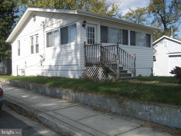 Quaint cottage perched on a corner lot, one block from the Chesapeake Bay! Short distance to the boardwalk, bakery, restaurants, shops, Post Office and the Farmer's Market! There is both off street and on street parking. Attached shed for storage. Located in the Town of North Beach. Trash/recycling and bulk pick up service provided. Great lot and location.