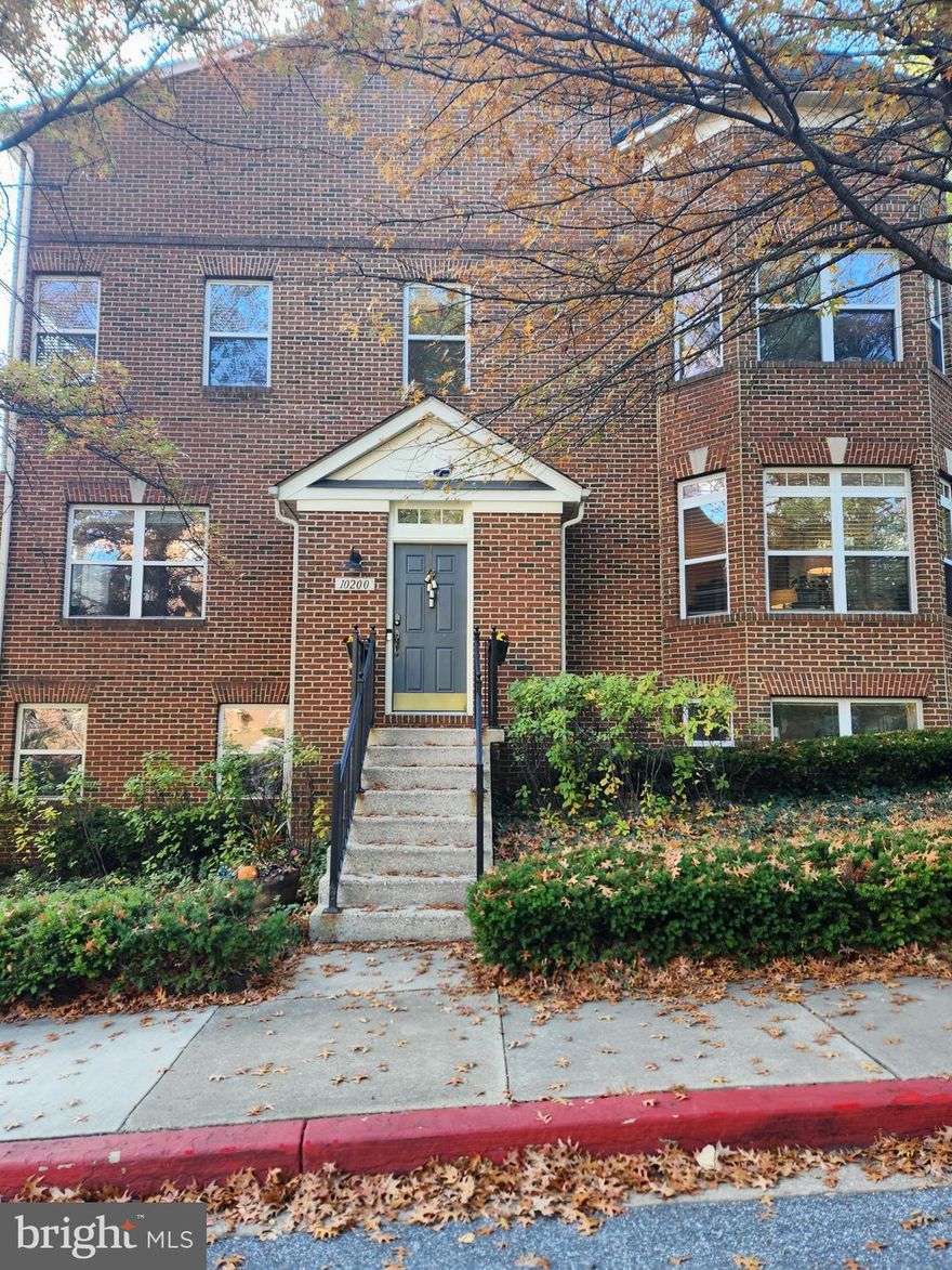 This unique freshly painted townhouse, offers a perfect blend of comfort and style, making it an ideal place to call home. With 2,434 square feet of thoughtfully designed living space, this end-of-row gem features three spacious light filled bedrooms and 2 full bathrooms and 2 powder rooms, including a luxurious primary bath with a soaking tub and a beautiful tile stall shower and a large walk-in closet. When you step inside this corner brick town house, you will discover a warm and inviting atmosphere, highlighted by beautiful hardwood floors and new elegant crown moldings on the main level. Newly installed hardwood steps and hardwood floors on the second level. The combination dining and living room area surronded by windows, fills this area with plenty of light and  is perfect for entertaining.  The warm and enviting kitchen has granite counter tops, new stainless steel stove, new microwave, new Bosch refrigerator and stainless steel dishwasher . There is a convenient kitchen counter and table space eating area combined with a family room and fireplace that  adds a touch of warmth on chilly evenings.  The outdoor deck off of the kitchen, provides a convenient spot for morning coffee or evening gatherings.  Additional features include recessed lighting, in the kitchen and family room areas. All the bedrooms have several windows that provides plenty of light,  one bedroom features wall to wall windows  and built-ins for clothing and storage in the closet.  The lower level has brand new tile and neutral color carpet in the recreation room and bonus room that can be used as an office/or exercise room.  This level also has a large closet for additional clothing or storage, a powder room and laundry area with new washer and dryer.  The two zone aircondition system has 2 brand new air conditioners. There is a large spacious two car garage side entrance.  This home is minutes away from, resturants, shopping malls, entertainment centers, parks and recreation areas.