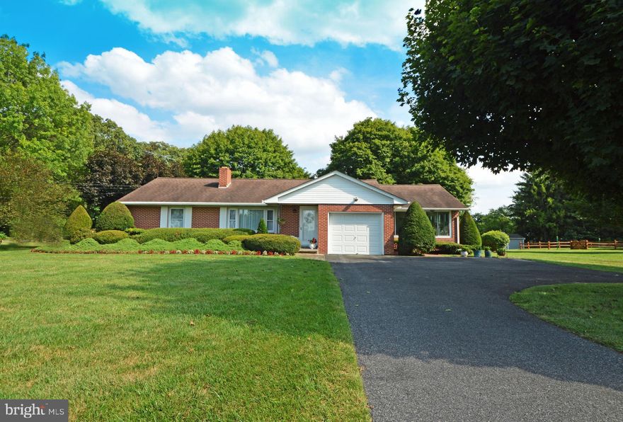 Located in the highly sought-after Hereford Zone, 1.5 Miles from Pretty Boy Dam. Drink-in the breathtaking view from the front yard and living room.  Spacious yet cozy four season sun porch where you and your family and friends can enjoy, dining, watching the game or simply relaxing. Wood burning fireplace, two cedar lined closets. Hardwood floor under carpet. Three beds, Two full baths,  attached 1 car garage, driveway with room for 5 car parking. Finished basement with full bath, perfect for family room and playroom. Large grassy yard perfect for entertaining adults and kids alike. You'll feel the love when you enter this home which has been impeccably maintained by one owner.