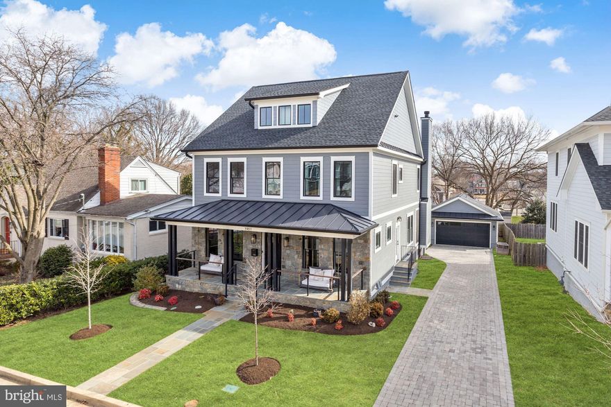 Welcome to the Cherrydale Charmer!  This remarkable 2-year-old Custom Craftsman home has everything and more.  Nestled in the highly desirable and conveniently located Cherrydale neighborhood you can be close to it all while still having your own private oasis to relax in.  This stunning 6 BR / 5.5 BA house over 4 levels has the exceptional interior & exterior features you are going to love.    The beautiful front entrance complete with bench swings leads into the foyer where the home office sits to the right.  Straight ahead, the main living area combines a beautifully laid out kitchen, dining and living room.  The gourmet kitchen has state-of-the-art appliances, an expansive island with seating and a walk-in pantry. The dining room has a butler’s pantry with custom oak cabinets and a built-in wine fridge.  The living room is drenched in natural light and has a gas fireplace surrounded by a floor to ceiling brick wall.  The beamed ceiling and atrium doors add architectural interest and a sense of coziness. From here step out onto the screened porch, with its own fireplace and ceiling fan for year-round enjoyment.  The main level is completed by a mudroom with ample built-in cubbies for serious organization.   Upstairs you will find the Primary BR, w/ his & her walk-in closets & a luxury bath with a massive soaking tub, separate rain shower & expansive dual vanity.  The 2 other generously sized bedrooms are complete with walk-in closets and beautiful high-end custom bathrooms.  This level is topped off by a large functional laundry room w/ storage built-ins!    This house was made for today’s modern living.  The top floor of the house is one large bedroom or great for a home office complete with a full bathroom and connected outdoor patio off the back so you can see your family in the backyard or look for miles at the beautiful view of the Arlington tree tops.    Downstairs in the lower level is the 5th bedroom and bathroom with its own entrance to backyard and incredibly large rec room for whatever ones heart desires.  OUTDOOR AMENITIES? WE HAVE THEM ALL.  It is rare for an Arlington home to offer all these amenities; don’t let the lot size fool you on paper. Starting with the front porch complete w/ two bench swings.  As you walk along the beautifully laid custom driveway pavers that lead to the garage and flow into a beautiful flagstone patio. The backyard has a gorgeous flagstone patio with a connected gas line grill. The yard has a stone and pea gravel path along the side and is fenced on three sides. The children’s playground set that will provide fun for many years to come.     The oversized 2 car garage has its own heating/cooling system with customizable/adjustable sleek storage system along all walls and a pull-down storage attic for more space or potential expansion.