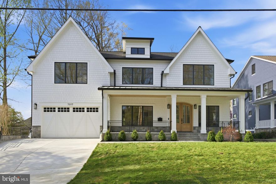 Welcome to 7017 Richard Drive, an extraordinary new custom residence by ERB Properties, perfectly positioned in Bethesda’s prestigious Burning Tree Valley. Offering over 6,000 square feet across three finished levels, this architecturally refined home blends modern sophistication with timeless design, delivering the scale, craftsmanship, and lifestyle expected in the Walt Whitman High School district.

The main level is defined by soaring ceilings, expansive windows, and an effortless open flow designed for both everyday living and elevated entertaining. A chef’s kitchen anchors the space, showcasing an oversized island, professional-grade appliances, generous pantry, and sun-filled breakfast area that opens seamlessly to the inviting family room. Elegant formal living and dining spaces add a sense of classic luxury while maintaining a warm and functional layout.

Upstairs, the private primary suite serves as a true retreat with dual walk-in closets and a spa-inspired bath designed with refined finishes and thoughtful detail. Three additional bedrooms with ensuite or adjacent baths and a well-designed laundry room complete the upper level.

The fully finished lower level enhances the home’s versatility with a spacious recreation room, a dedicated fitness studio with mirrored wall and rubber flooring, a guest bedroom, and a full bath—ideal for wellness, entertaining, or extended stays.

Outdoor living is equally impressive, featuring a covered upper deck and lower patio overlooking the fenced and professionally landscaped yard, creating a peaceful and private setting. A two-car garage completes this exceptional offering.

Zoned for Burning Tree Elementary, Thomas W. Pyle Middle School, and Walt Whitman High School (buyer to verify). A rare opportunity to own a newly built luxury residence in one of Bethesda’s most established and sought-after neighborhoods.