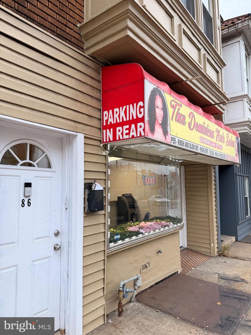 Ideally located near the train station, this legally zoned multi-use property offers exceptional versatility for both owner-occupants and investors. The first floor currently features a well-maintained salon operated by the owner and will be delivered vacant at closing, (Does not include Hair salon equipment) providing a turnkey opportunity for a new business or additional rental income.
The second level includes a spacious one-bedroom apartment with access to a private roof deck, as well as a separate studio currently rented for $1,200 per month. The studio tenant may remain or vacate at closing, depending on the buyer’s preference. An additional first-floor studio—complete with a full kitchen and full bath—offers the potential for an extra $1,200 per month in rental income.
The property also benefits from a recently updated roof, replaced just two years ago.