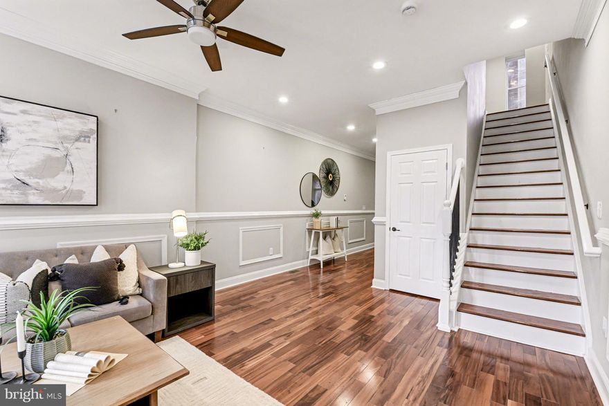 Beautifully renovated from top to bottom in 2016, this stylish home blends high-end finishes with everyday comfort. Enjoy gleaming hardwood floors, crown molding, and a gourmet kitchen perfect for cooking and entertaining. The spacious primary suite offers a true retreat, complemented by an upper-level laundry room for added convenience. A finished basement provides bonus living space, while the large fenced yard could be transformed into an inviting outdoor escape.

Additional updates include a brand-new roof (Dec 2025) and modern systems with central A/C and gas forced-air heat. Located in a highly walkable neighborhood with easy access to bus and train routes—and just moments from Mount Vernon, The Bromo Arts District, Bolton Hill—this home delivers both luxury and lifestyle in one exceptional package.