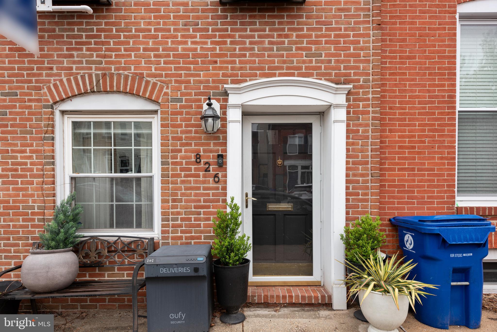 This stunning 12-foot wide, 3-bedroom, 2.5-bath townhome in the heart of Canton is a true gem, offering over 2,400 square feet of exquisite living space! The home is highlighted by beautiful inlaid hardwood floors, charming exposed brick, recessed lighting, and intricate crown molding and wainscoting throughout. The upgraded kitchen boasts sleek stainless steel appliances and gorgeous granite countertops! On the second floor, you'll find two spacious bedrooms, a full bath with a separate tub and shower, and a convenient laundry room. The third-floor master suite features a private common area with access to a rooftop deck, where you can soak in breathtaking views of the harbor and skyline! Plus, the roof was newly replaced in 2022!