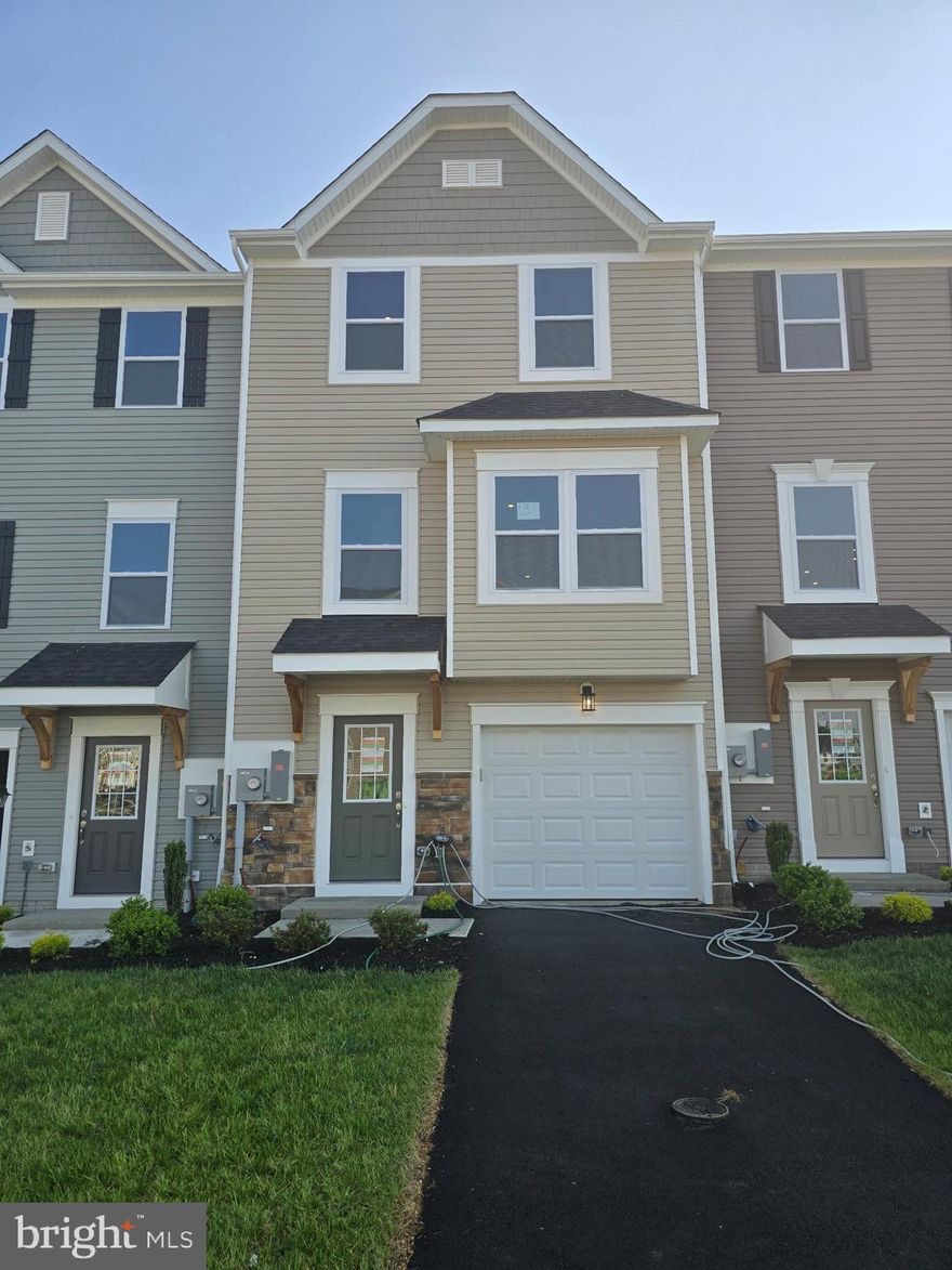 **PRICE IMPROVEMENT-now $2100

Experience the epitome of modern living in this exquisite new construction townhouse, completed in 2025, nestled in the prestigious South Brook community. This stunning residence showcases a harmonious blend of traditional and transitional architectural styles, offering a timeless elegance that invites you to call it home. Step inside to discover a thoughtfully designed interior featuring luxurious vinyl plank flooring and plush carpeting, creating a warm and inviting atmosphere throughout. The advanced framing and superior insulation ensure comfort year-round, while the brick front adds a touch of sophistication to the exterior. This property boasts an attached garage with a front entry, providing both convenience and security. Enjoy the ease of parking in your private driveway or the nearby parking lot, making everyday living a breeze. With a minimum lease term of 12 months and availability starting June 21, 2025, this home is perfect for those seeking a long-term sanctuary. The excellent condition of the property ensures that you can move in with peace of mind, ready to embrace a lifestyle of comfort and luxury. Indulge in the exclusive amenities of South Brook, where community living meets refined elegance. 
Don't miss your chance to rent this great townhome-contact me or your agent today to find out more.