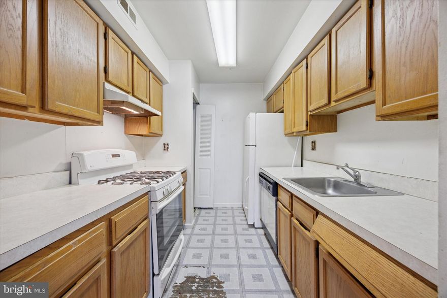 Exciting Opportunity to Create Your Dream Home! This 2-bedroom, 1.5-bath home in Red Lion Commons has great potential—it just needs your personal touch. Tucked away at the back of the building for added privacy and minimal noise, the unit is easily accessible via a walkway from the assigned parking space. The first floor features an open-concept living and dining area, along with a functional galley kitchen. A spacious storage area under the stairs provides ample room, making downsizing a breeze. Upstairs, you'll find two generously sized bedrooms with ample closet space, along with a large three-piece bathroom. The conveniently located washer and dryer sit just off the bath for easy access. Enjoy affordable living in a prime location—come take a look today!