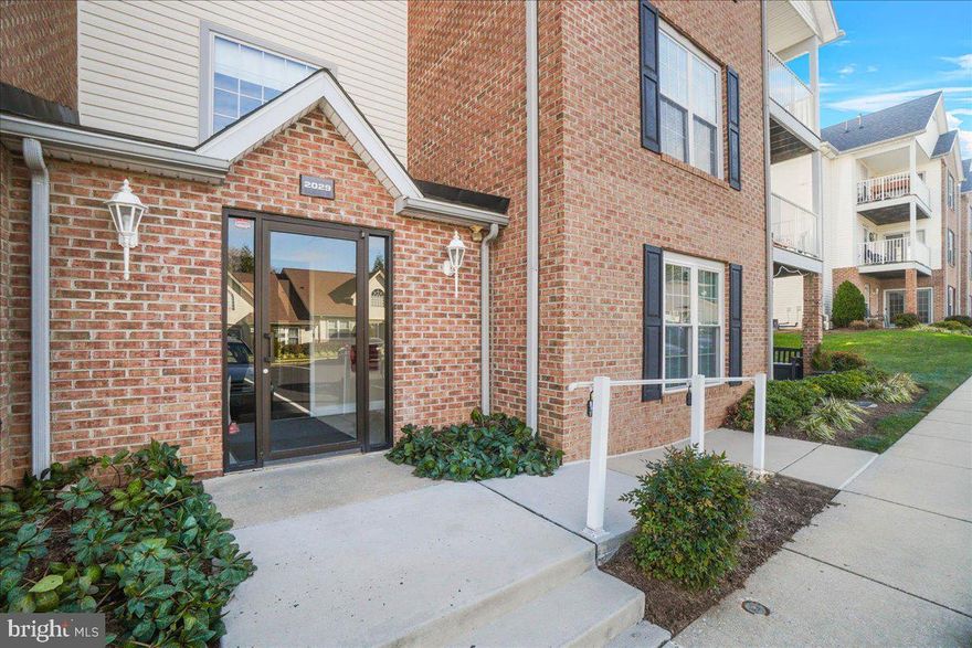 Winifred Manor is an over fifty-five, independent living (it is not assisted living), and private condominium community in Eldersburg, Maryland.  All residents must be fifty-five (55) years of age or older and will be required to sign an affidavit and provide proof of age as a condition of residency. 
A charming handicap accessible 2-bedroom, 2 full bath, first  floor condo in Winifred Manor.  This condo offers an open floor plan, a rear facing patio (not facing the parking lot), fully equipped kitchen with a pantry and breakfast bar and a washer/dryer inside the condo. Primary bedroom with full bath and a large walk-in closet plus a second bedroom/den offering plenty of space. The secured building has a double-keyed entrance, a sidewalk ramp to the front entrance, and an elevator as well as stairs to the second floor unit. The active adult 55+ community is located in the heart of Eldersburg, close to several restaurants, grocery stores and shopping. Downtown Sykesville is nearby, as well as the Carroll County senior center. Relax on the patio, stroll down to the community hall for card games and other activities, or hang out at the community gazebo. One assigned parking space  near the entrance door, water is included in condo fee, 
Winifred Manor allows small dogs (up to 30 pounds), cats and only two pets per unit. Prior to settlement, any dog owner must provide a letter on letterhead stationery from the veterinary with:
Most recent shot records. Copy of license.
Current weight of dog and if dog is still growing, the expected weight the dog will be.
Please be advised that the Winifred Manor is close to becoming SMOKE FREE COMMUNITY.  
There is a $100 move in fee and $100 move out fee for midrise residents.