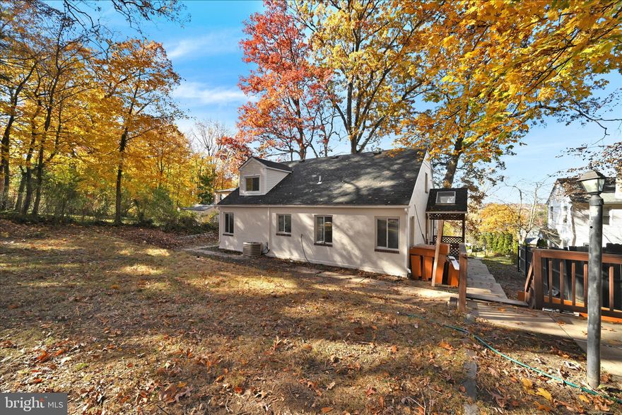 PRICE REDUCED TO  OVER $25,000 BELOW PROFESSIONALLY WRITTEN APPRAISED VALUE TO THIS GEM, LOADED WITH SPECIAL TOUCHES IN A TOTAL REHAB. Appraisal available for any interested parties. Market time so far on this gem of a home was due to during-complete-renovations exposure offering Buyers a chance to pick their improvement personalized touches. Now this gorgeous property with a view is ready to be appreciated by the disciminating Buyer.  Totally renovated pool will have a cover and closed down by pool company as condition of purchase. This property has 2 CAR OFF STREET PARKING IN REAR off Tyson Ave through a driveway easement granted the property by deed to neighboring property on Tyson Ave.  Court Records square footage may not include the large, separate pool area 2nd parcel which spans well beyond the chain link, fenced in area. placed for sale inclusive on the same deed. This majestic, expanded cape with LARGE REAR ADDITION toward the pool IS A MUST SEE INSIDE, NOT A DRIVE BY.  Much large than it appears when viewed from Grovania  Ave. Also, please check documents for build-out remodel schematic floor plan. This is the SIGNATURE PROPERTY OF THE NEIGHBORHOOD. The  beautiful, INGROUND POOL is a total upgrade with a newly installed luxury liner, brand-new filtration system, and a transferrable warranty. The yard offers privacy and comfortable pool enjoyment with mature trees surrounding the yard. The second, and main parcel reaches all the way up to a PRIVATE  ACCESS 2 CAR  PAD IN REAR OFF Tyson Av, forming an L-shaped yard.. This is a complete renovation inside and out, right down to the custom 1ST FLOOR FULL BATH WITH HEATED, CUSTOM TILE FLOOR SYSTEM.   One of 2 full baths in the home. The home sits elevated on a newly landscaped yard, giving a great view at the morning breakfast table. Inside your home are luxury vinyl  tiled floors, newly renovated full baths, kitchen with a great, luxury appliance package including dishwasher, refridgerator and stove,  upgrade, quartz counters and white shaker style cabinets with black knob handles. New custom tile splash coming. DISHWASHER WITH ICE MAKER NOT IN PICTURE IS BEING DELIVERED. Floors have new carpets, luxury vinyl flooring throughout, and an acid washed,  vented stone fireplace accenting the living room. All new vinyl windows throughout. Well over $100,000 in renovations! Pool fully renewed with luxury liner, with bathhouse, and new filtration system. Roof has 2012 installed dimensional shingles according to 2012 BrightMls court records listing info, freshly power washed by us. Pool has been winterized and shut down with cover per pool company specs. All exterior concrete walkway pressure washed, and the front, curb appealing yard was trimmed back, removing all front of home bushes that were hiding this gem from the road., and the trees freshly mulched.