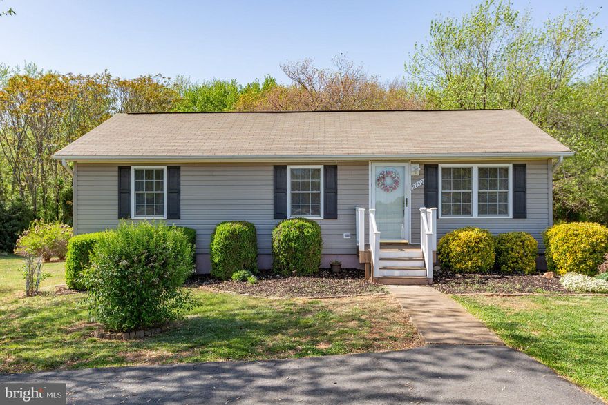 Have you been looking for a detached home under $300,000 with land? Well HERE IT IS! This 3 bedroom 1 bathroom single level home has been professionally cleaned and is ready for its new homeowner.   Walk into this cozy home from the newly installed composite front porch and you will be in the  living room with paint colors giving a coastal beach vibe that creates a calming and relaxed atmosphere. The natural light that floods the kitchen gives a warm and welcoming ambiance that is perfect for cooking on the stainless-steel stove. The eat-in kitchen area is an extension of the galley kitchen, offering a comfortable and casual dining space. With the addition of fans in every room, the hallway leading to the 3 bedrooms and shower/tub combo bathroom offers a seperate living experience from the rest of the house .  The 3 bedrooms offer flexibility in use, such as using one as a home office or a guest room. The 20x24 detached garage can be used for more than just storing cars. It can be converted into a workshop, home gym or hang out area for entertaining guests. The property is situated on a generous one-acre lot, providing ample space for outdoor activities, gardening, or pets to run around. The property offers a tranquil setting away from the hustle and bustle of the city, yet it still has fiberlync fiberoptic internet. Enjoy the peacefulness and fresh air while still having easy access to nearby amenities such as Lake Anna State Park. USDA eligible property! Book your showing today!
