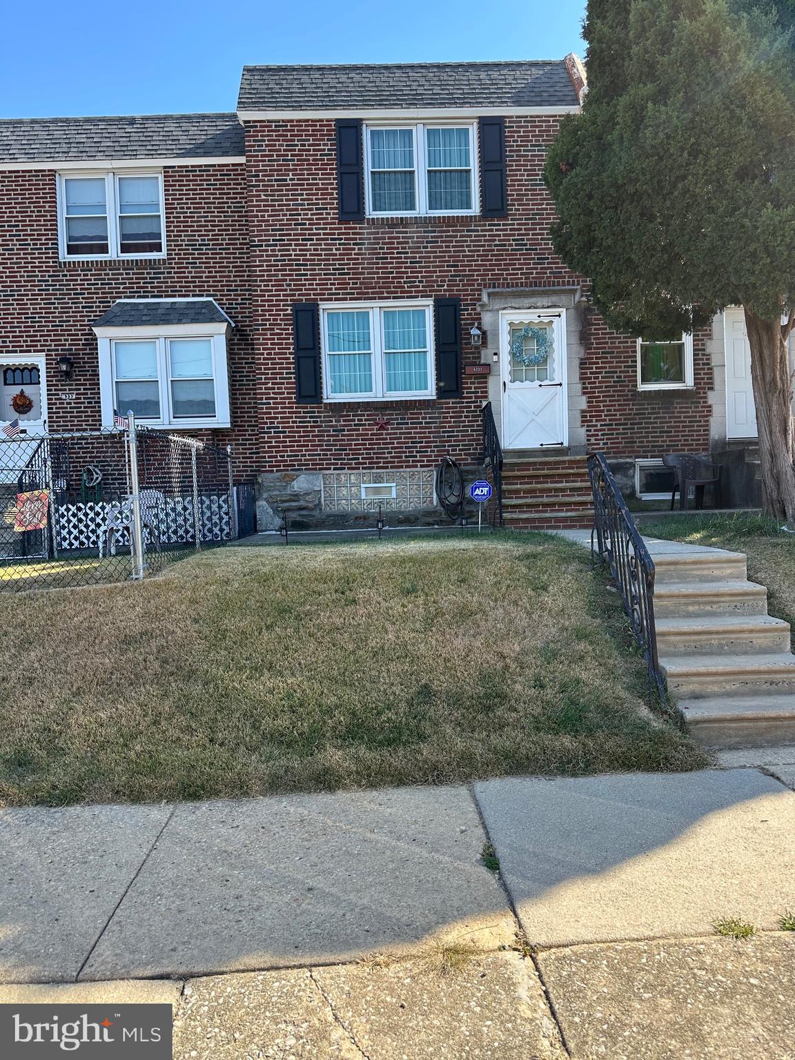 Nicely maintained 2 story Brick row with front patio and brick steps.  Features  a large living room, dining room and eat-in-kitchen...The second floor has 3 nice sized bedrooms with a lot of closets and a 4 piece ceramic tile bathroom.   There is a semi-finished basement with glass block windows and additional space from the converted garage to use as you wish, a laundry area with exit to the rear fenced driveway, the other portion of the garage is used as storage.........Other features, replacement windows, hot water heater installed 2024, security system...This home is being sold in "as-is" condition.  Close to shopping, transportation, schools and major roads.