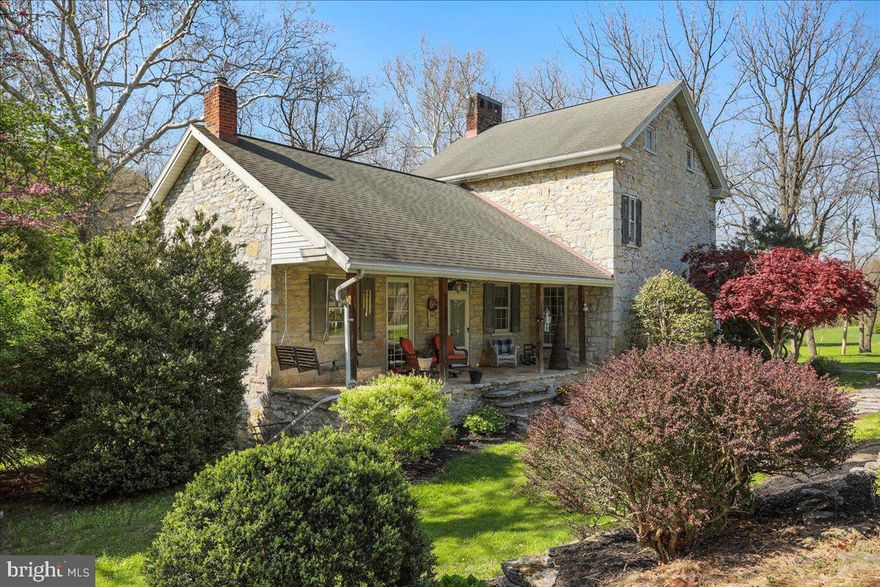 Experience the perfect blend of historic charm and modern living in this beautifully renovated 1843 limestone farmhouse, nestled on 30± picturesque acres of rolling open fields and tranquil woods. This unique property offers 3 spacious bedrooms, 1 full bath, 2 half baths, and a finished basement, providing ample space for everyday living and entertaining.
Outdoors, a peaceful stream winds through the land, adding to the serene atmosphere. A large pole barn offers storage and livestock potential, while the original barn has been thoughtfully converted into a man cave or entertainment space—ideal for hosting friends and family. This property is a rare find for those seeking privacy, space, and timeless beauty. This property will be offered at auction on Friday July 11, 2025 @ 3:00pm. The List price in no way represents a minimum, starting, or acceptable bid.