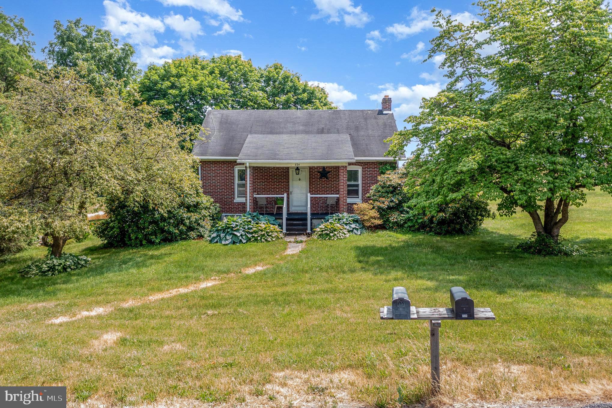 Welcome to 724 Delta Road in Red Lion!! Minutes from the boro this home will give you the country feel you are looking for. Featuring 3 bedrooms (the primary bedroom and bathroom on the main floor) and a finished basement (could be used for another family room or a large bedroom!) this cape cod cutie sits on three quarters of an acre with a million dollar view from the back yard. Plus an attached one car garage, detached two story two car garage with a workshop, covered front porch, mature landscape for privacy and your own solar panels! How does a monthly electric bill lower than $50 sound?? This is a RARE find! Come see this move in ready home before its gone!