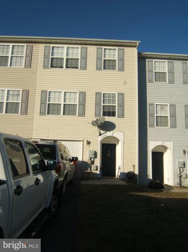 Every level remodeled! New carpet, ceramic tile, hardwood floors, paint, blinds and appliances. Lower level offers flexible space with bath and laundry with new washer/dryer- could be guest room, rec room, home office, etc.. Large living room/kitchen/dining space w/ 1/2 bath on main level and 3 bedrooms and 2 baths on upper level. Rear deck with fenced back yard is super bonus!