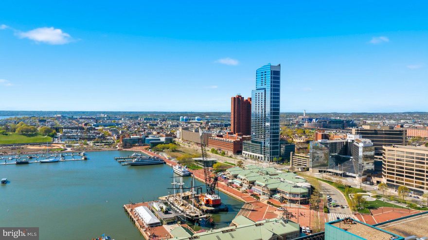 Experience elevated city living with breathtaking Inner Harbor views from this stunning 30th-floor 2BR/2BA condo in the heart of Downtown Baltimore.

Step into a light-filled, open-concept layout featuring hardwood floors, recessed lighting, and a soft, modern palette—all complemented by panoramic water views from every room. The spacious living area flows seamlessly into the kitchen, complete with stainless steel appliances, granite countertops, ample cabinetry, and a breakfast bar overlooking the main space. The thoughtfully designed layout offers privacy with bedrooms on opposite sides. The primary suite features a walk-in closet and a private full bath with a walk-in shower, while the second bedroom sits adjacent to a full guest bath—perfect for visitors or a home office. Enjoy your morning coffee or unwind in the evening on the private balcony with sweeping skyline views. Residents have access to premium amenities including a rooftop pool, fitness center, and business center.

All this just steps from dining, shopping, entertainment, major commuter routes, and Baltimore’s iconic stadiums—plus the convenience of secure garage parking and low-maintenance condo living.