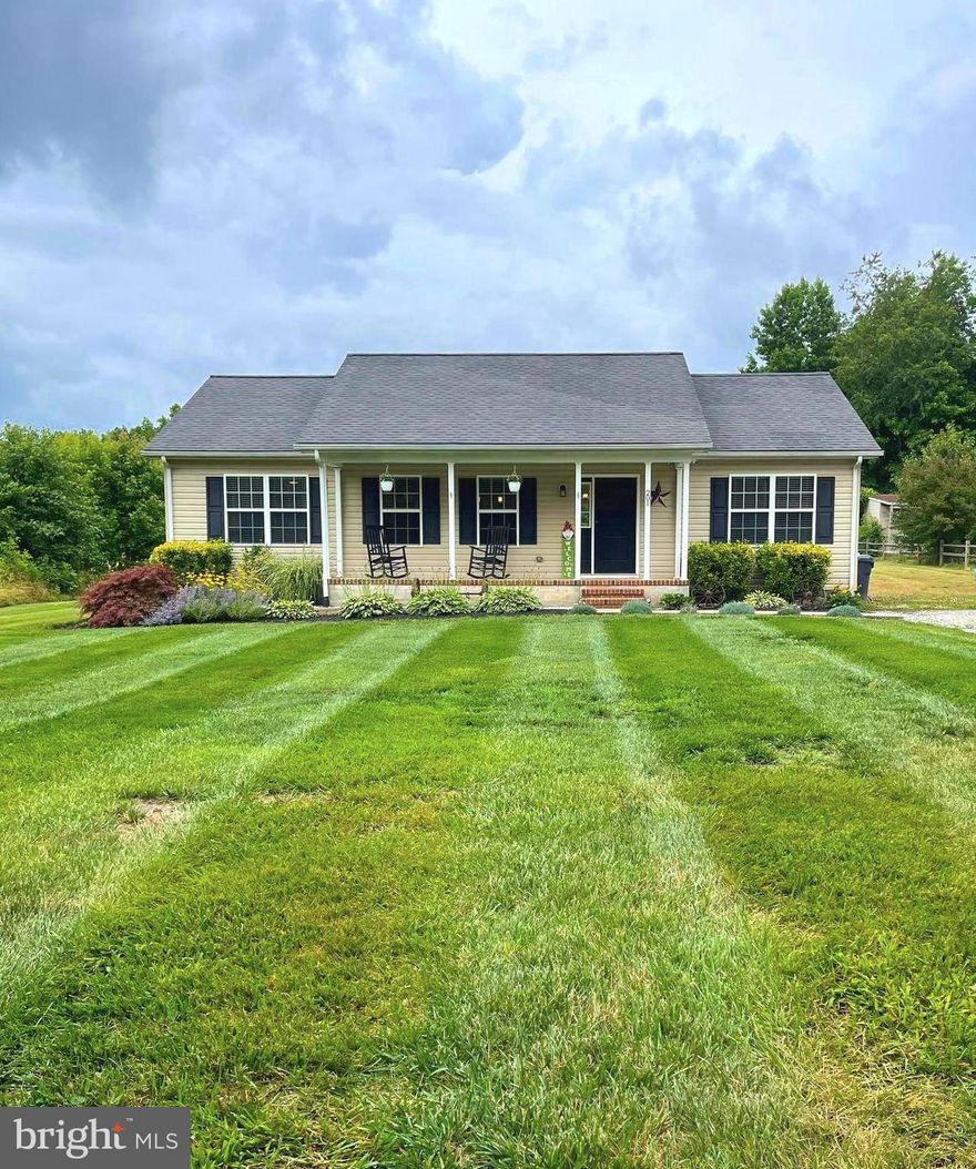 Great Opportunity to own this Beautifully taken care of 3 Bedroom, 2 Full Bath Single Family Home on over 1/2 Acre. Walking through the Door you will Fall in Love with the Open Concept very inviting Family Room/Kitchen Combo. The Primary Bedroom with Full Bath are on one Side of the Home and the Two other Bedrooms on the other with Hall Full Bath. Home Features Hardwood Flooring through-out including all the Bedrooms. Kitchen includes: New Subway Tile Backsplash, Electric Range, Microwave  Refrigerator w/ Ice Maker, with plenty of Cabinets and space for a Kitchen Table and Island w/ Electric for those days you want to plug in that Crockpot. The Kitchen Slider leads you out to a Relaxing Wood Deck you can sit and have your Coffee in the Morning as you overlook the Large Backyard w/ an oversized Shed. Primary Bedroom features an en-suite and Walk-In Closet. Home Interior has been recently painted, the Hall Bathroom has a new Light, Sink and new Hardware. The Kitchen and Primary Bedroom have been recently updated to include featured Shiplap Walls. Additional perks, home conveys w/ a Dahua Technology Camera Security System which includes Four Cameras w/ Recorded and Owned Water Conditioner in Crawl Space, Hot Water Heater has new Heater Element and Thermostat, Newer Microwave. Approximately 5 miles to Shopping Center w/ Grocery Store, Ace Hardware, Walgreens, Dunkin Donuts and more... No Home Sale Contingencies Accepted. Offer Deadline 4pm on Monday 6/26, please submit best and final.