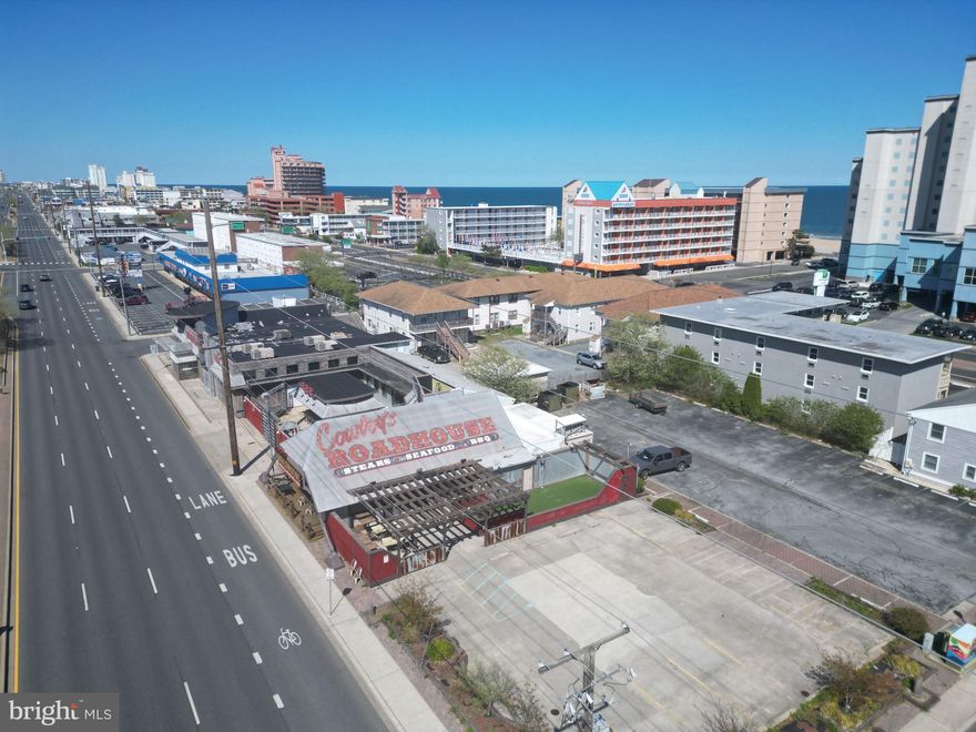 If these walls could talk!! Another Historic location being offered. What many people and old customers know as the "Paddock Night Club" is officially on the Market.
Of course now known as "CowBoy Coast" this 10,000 +- sq foot bar sits on just shy of 1 acre of commercially zoned land! Plans in hand for a true conversion if your interested. Otherwise let put something together and re-create this incredible location just a stones throw from our famous boardwalk. Call listing agent today for a tour.