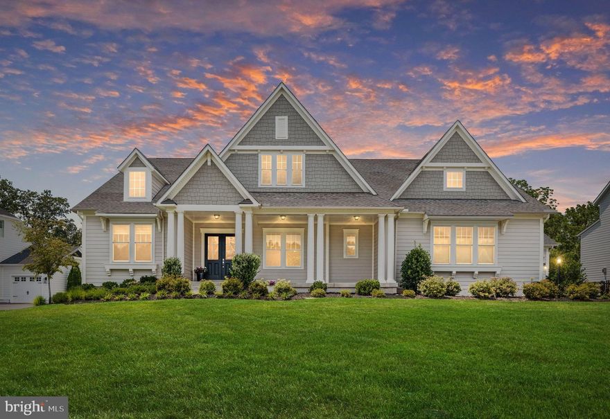 STUNNING AND SPACIOUS RAMBLER in award-winning WILLOWSFORD!!  This popular and rarely available Drees Annandale is the ultimate main level living floor plan with 3570  finished sq ft on the main level and an additional 2400 finished sq ft on the lower level.   Space abounds in this like-new home loaded with upgrades and features.  The main level boasts 10 foot ceilings, custom tray ceilings, hardwood floors, a home office, and a great room with living and dining spaces complete with a wall of windows and sliding doors leading to a large covered back porch with gas fireplace and pre-wired for outdoor tv.  Back inside, the highlight is the dream Chef's kitchen showcasing high-end appliances including a Sub-Zero built-in refrigerator, Wolf double ovens, gas cooktop, microwave and warming drawer, as well as two dishwashers and an abundance of cabinetry with pull out shelving and under-cabinet lighting, a pot filler, and custom wine bar to top it off!  On this level you will also find an expansive primary suite with an impressive bathroom featuring a pocket door, architectural barrel ceiling, stand alone bathtub, dual vanities, custom-tiled shower, and large closets with built-ins for all your storage needs.  A generously sized laundry room with sink and additional cabinetry is conveniently located adjacent to the primary suite and just off the entry from the 3-car garage. Two secondary en-suite bedrooms and one half bathroom round out this main level.  A beautiful, wide staircase leads you to the lower level, where you will find a sprawling recreation room, a fourth en-suite bedroom, a bonus room perfect for a home gym, media room, or guest bedroom, and an additional 1170 sq ft of unfinished space with a rough in for a full bathroom or wet bar.  The French doors will lead you to the flat backyard overlooking a beautiful protected conservancy with spectacular mountain views and sunsets.  Additional features include a whole-house central vacuum, electric car chargers, pre-wired speaker system in the main living area and covered porch, landscape lighting and irrigation system.  Don't miss your chance to own this stunner of a home situated on one of the most private and picturesque streets in all of Willowsford!  Award-winning Willowsford prides itself on vast open spaces and a variety of healthy-living amenities, including two clubhouses with resort-style pools, fitness center, zipline, treehouses, children’s splash park, hiking and biking trails, campsites and picnic areas, sledding hills, dog parks, fishing ponds, archery range and a working farm. Ready to call Willowsford and this spectacular turn-key home yours? Schedule your visit today!