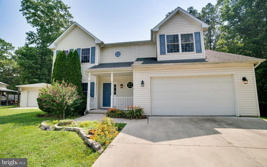 Welcome to your warm and peaceful retreat at 16 Rowles Lane in North East, Maryland! Pick your color and add a fresh coat of paint, as this stunning spacious six bedrooms and two and a half baths home, will shine with your style with a little TLC as it is being sold "AS IS." 

Nestled on a generous two-thirds of an acre, at the end of a peaceful short gravel road, this property offers the privacy and serenity you've been seeking. The backyard, enveloped by a serene wooded area, creates a picturesque natural setting, providing the perfect spot to unwind and rejuvenate. Imagine spending evenings on the deck, hosting gatherings, and enjoying the warmth of a crackling fire pit with friends all around. For those who love nature or gardening and no restrictions of an HOA, the expansive fenced-in backyard presents endless possibilities for animal enthusiasts and green-thumbed individuals alike.  

As you approach, you'll be welcomed by an inviting front porch that leads you into the elegant two-story foyer. The kitchen, featuring large granite countertops, is a chef's dream as it seamlessly connects to the spacious family room, becoming the heart of the home. For more formal gatherings, the dining room boasts raised paneling and crown molding, adding a touch of sophistication. The formal living room provides a separate space for relaxation and enjoyment.  Throughout the house, large windows allow natural light to flood in, creating a warm and inviting ambiance. Upstairs, the master bedroom awaits, offering a spacious sitting area, a large walk-in closet, and a master bathroom with double sinks, a jacuzzi tub, and a separate shower. Three additional generously sized bedrooms upstairs share a full bath, and the convenience of the second-floor laundry room makes life easier.

The fully finished basement, with a separate entrance, opens up exciting possibilities, offering two additional bedrooms and ample living space – perfect for entertaining or creating a separate living suite.

Car or boat enthusiasts and hobbyists will appreciate both the attached two-car garage and the detached two-car garage with a workshop, providing plenty of space for your vehicles, projects, and storage.

This home is situated with public water and sewer and without any HOA restrictions, offering a hassle-free lifestyle. Enjoy the charm of North East, with easy access to water activities and the town's historical appeal, all just minutes away. Moreover, the property's location is superb, with Philadelphia and Baltimore within an hour's drive, granting you the chance to explore city amenities while always having a peaceful haven to return to. Come and experience the boundless potential of 16 Rowles Lane – your forever home awaits!