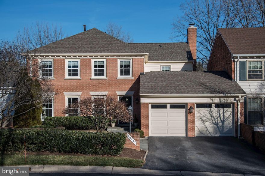 Beautifully renovated! Impeccably maintained 4 BR, 2.5 BA in the Worland (Court 5) community. Neighborhood features lush, landscaped walking paths and common areas, combined with easy access to shopping, dining &NIH. In addition, the home is near to parks, recreation & highly-rated schools*.  The spacious floor plan boasts over 3,200 square feet of living space and a two-car garage, along with a private rear garden and terrace.  Refinished hardwood floors flow throughout. Extensive living room and dining room provide excellent space for entertaining. Renovated kitchen showcases granite countertops, stainless steel appliances, recessed and pendant lighting, and a sunny breakfast area. Open to the kitchen the family room features a gas fireplace with wood mantle and custom built-ins. French doors open to the private garden and terrace.  Stunning master suite contains an ensuite bathroom, walk-in closet and sitting room. Three additional spacious bedrooms, with large closets. Thoughtfully designed for everyday living, the garage opens directly to the mudroom/laundry room with abundant cabinetry for storage and easy access to the kitchen and family room. Lower level provides a comfortable finished space, perfect for a media room, second living room, or office/den.