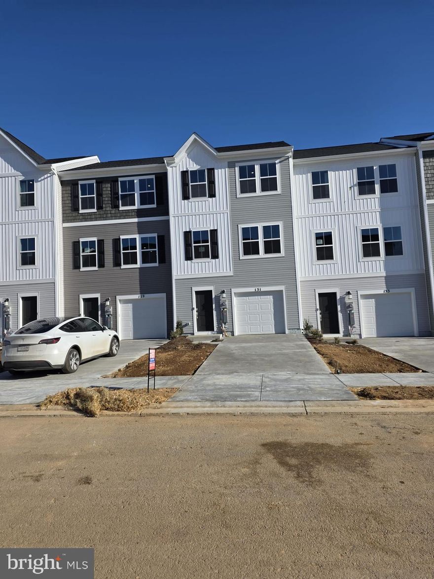 Welcome to The Gallery, one of Martinsburg’s newest communities! Conveniently located near shopping, dining, recreation, and just minutes from I-81, this home offers comfort and accessibility.

Enter on the lower level where you’ll find a spacious recreation room — perfect for a home office, gym, or additional living space — along with access to the one-car garage and backyard.

The main level features an open-concept layout with a bright great room flowing into the dining area and kitchen. The kitchen includes stainless steel appliances and ample cabinet space. A convenient half bath is also located on this level, ideal for guests.

Upstairs on the upper level, you’ll find all three bedrooms, two full bathrooms, and the laundry area for added convenience. The primary suite offers a private full bath and generous closet space. Bedrooms two and three are well-sized and share a full hallway bathroom, making this level both functional and comfortable for everyday living.

✨ Homes in this desirable community rent quickly — submit your application today and secure this beautiful home before it’s gone!

Add that its a end unit

Here is the updated version including that it’s an end unit:

Welcome to The Gallery, one of Martinsburg’s newest communities! Conveniently located near shopping, dining, recreation, and just minutes from I-81, this beautiful end-unit townhome offers added privacy, extra natural light, and enhanced curb appeal.

Enter on the lower level where you’ll find a spacious recreation room — perfect for a home office, gym, or additional living space — along with access to the one-car garage and backyard.

The main level features an open-concept layout with a bright great room flowing into the dining area and kitchen. The kitchen includes stainless steel appliances and ample cabinet space. A convenient half bath is also located on this level, ideal for guests.

Upstairs on the upper level, you’ll find all three bedrooms, two full bathrooms, and the laundry area for added convenience. The primary suite offers a private full bath and generous closet space. Bedrooms two and three are well-sized and share a full hallway bathroom, making this level both functional and comfortable for everyday living.

✨ End units in this desirable community are in high demand — submit your application today and secure this beautiful home before it’s gone!