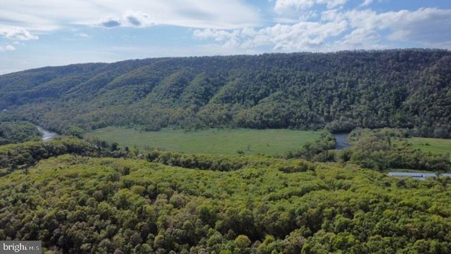YOUR VERY OWN SPACIOUS 5+ ACRES IN ALMOST HEAVEN WV! CAMPING, MOBILE HOMES AND RECREATIONAL ACTIVITIES ARE ALL WELCOMED! PROPERTY IS LOCATED JUST UNDER 1 MILE  TO THE SOUTH BRANCH POTOMAC RIVER PUBLIC ACCESS.CUMBERLAND,MD IS A SHORT DRIVE AWAY! THERE IS NOT AN ACTIVE HOA AND WE'RE NOT SURE IT WAS EVER ACTIVE.