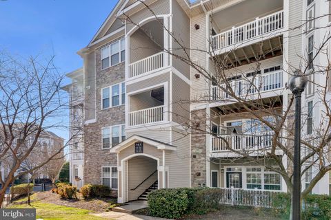 Photo of 503 Sunset View Terrace SE #407, LEESBURG, VA 20175 (MLS # VALO2118032)