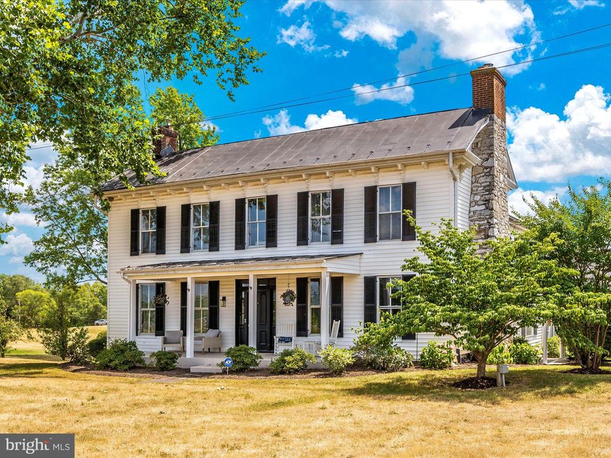 **One of a kind!** 

Introducing the meticulously renovated Historic Timberlake House and Farm, a captivating estate with deep roots in American history. The original portion of this house with split log walls dating 1755 is believed to be Mary Littler’s Tavern; this landmark served as a stop for General Braddock and a young George Washington during the French & Indian Wars. Nestled in the Northern Shenandoah Valley and minutes from I-81, this property offers easy access to Winchester and Dulles Airport, spread across nearly 7 acres of unrestricted land.

The main house has been beautifully restored, maintaining its original charm while integrating modern luxuries. It features split log walls, four fireplace accesses, newly renovated bathrooms, refinished original wood floors, herringbone tile floor, shiplap,  batten and board, and a kitchen equipped with granite countertops, stainless steel appliances, a stove pot filler, and wine fridge. Unique features include a secret bookcase leading to a two-story den with a stone fireplace and beamed ceiling, a special doggy shower in one of the bathrooms, and a rear double balcony/porch overlooking the grounds with beautiful sunrise and sunset views.

Connected yet separate with a private entrance, the estate includes a bright and airy, fully renovated, 1 BR/1BA 825sf in-law suite with butcher block countertops, stainless steel appliances, an open-concept living area, interior stone wall, private laundry and utilities, and a private rear deck. Currently being rented to traveling healthcare workers, this little gem brings in $2,000/month of consistent and proven rental income. There is an entrance to the apartment from the main house that is currently closed off for privacy, but can be easily reopened. 

Outdoor amenities include two outbuildings with electricity, one is a newly renovated separate structure with a front porch, dedicated metered electric, a brand new metal roof (2024), oversized windows, and more. With over 600 square ft., it will make a perfect office/gym/craft room/potential future rental, etc.  The other building, once used as a 2-story dairy barn, can be used for livestock, a workshop, garage parking for 3 cars in the upper-level 1000+ square foot space 

The estate includes a 3/4-acre shared pond with your own private dock sitting at the rear of the property and an additional hayfield to be used for your choosing. The paved circular driveway has two entrances, and you’ll also find a smokehouse, woodshed, and additional storage shed in the parking area, plus a 50 amp RV hookup.

Recent improvements & enhancements include: newly painted throughout interior of house and apartment, new carpet in the family room, renovated apartment kitchen, two new water heaters, updated glass, wood, and pocket doors, updated water system including water softener and iron breaker, new septic pump tank, and more!

This property is not just a home but a conservation piece, perfectly blending historical significance with contemporary comfort and luxury. Ready to move in, the Timberlake House awaits those who value heritage and modernity equally.

The home recently appraised for $1,000,000.  An enhanced home warranty is transferable as well.