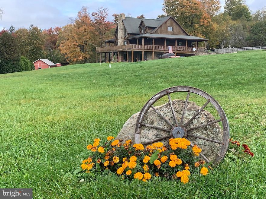 New Photos Coming Soon: Equestrian estate on 25 acres with a 5700sq ft custom built Yellowstone log home over looking the entire property and surrounding mountains. This property is enhanced with a 26,000sq ft horse riding arena with stables and a second level suite for an office. Located only 15 minutes from RT68 and Deep  Creek Lake this property is centrally located to everything the Garrett County has to offer. An added amenity is the proximity to Cunningham Lake and access to miles of trails and wildlife management yareas. This property was appraised at over 2million dollars 10 years ago.