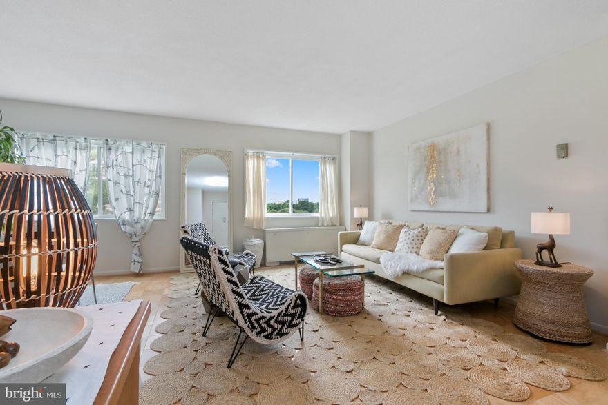 Experience the tranquility of this spacious 1 BR / 1 BA condo at University Towers! This unit offers an open floor plan, fresh neutral paint, hardwood floors, and new stainless steel appliances. Enjoy the peaceful, panoramic views through brand new windows. The hvac and electrical have also been updated. Monthly condo fee of $565 includes: utilities, parking, concierge, pool, and tennis courts. Convenient to parks, trails, shopping, schools, places of worship, and a variety of transportation. FHA APPROVED. RENTALS PERMITTED. Welcome home!