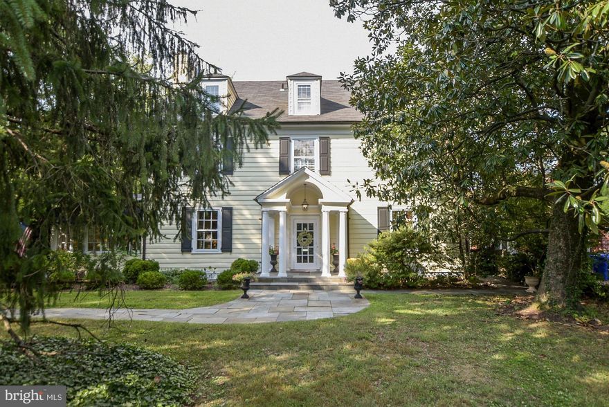 This outstanding classic residence provides a lovely, grand oasis in the heart of Chevy Chase, with extensive grounds, gardens and pool, within easy walking distance of downtown Bethesda. Its spacious floor plan provides over 5800 square feet of elegantly finished space. A grand reception hall entrance welcomes guests and opens to embassy-sized Living and Dining Rooms. A Sunroom running the depth of the house offers windows overlooking the garden and opens to the spacious terrace. The large Chef's Kitchen provides Viking refrigerator and six-burner stove, plenty of cabinetry, and opens to the Breakfast Room. A lovely open staircase with large landing leads to the upper levels of the residence. The first upper level offers a lovely paneled Study and a light-filled hallway separating the four spacious Bedrooms, including a spacious Master Bedroom with MBA. A second Master Suite is located on the third floor of the home. This floor was created by the current owners, who lifted the ceiling and designed lovely new space - and can be used as an Office, Family Room or Guest Suite - including a foyer, a new Bathroom with large shower and double sinks, a sitting area with fireplace, and two large walk-in California closets. The interior of this residence offers tasteful built-ins, custom fixtures, beautiful hardwood floors, soaring 10 and 11 foot ceilings and rich mill work trim. The oversized 18,000 square foot property provides exceptionally lovely space for outdoor enjoyment, including a large flagstone terrace, mature gardens, a large pool and detached garage. The residence enjoys a private setting with easy parking along Hillcrest Place and is positioned next to the Chevy Chase Club. The driveway for the two-car detached garage is entered from the side street; Hillcrest Place provides easy access to the front of the house, as well as extra parking. The current owners completed an extensive renovation including the addition of two-zone air conditioning, new electric systems, new windows, kitchen and bathroom renovations and the creation of the smashing third level from unfinished space. Newly priced at $2,250,000, the home presents an opportunity for the buyer to realize a great value, and to live in one of Chevy Chase's finest homes. Nowhere else is a home of this quality and size offered in the area at the current price. Previously listed for $3 Million, this is a splendid one-of-a-kind residence, not to be missed!