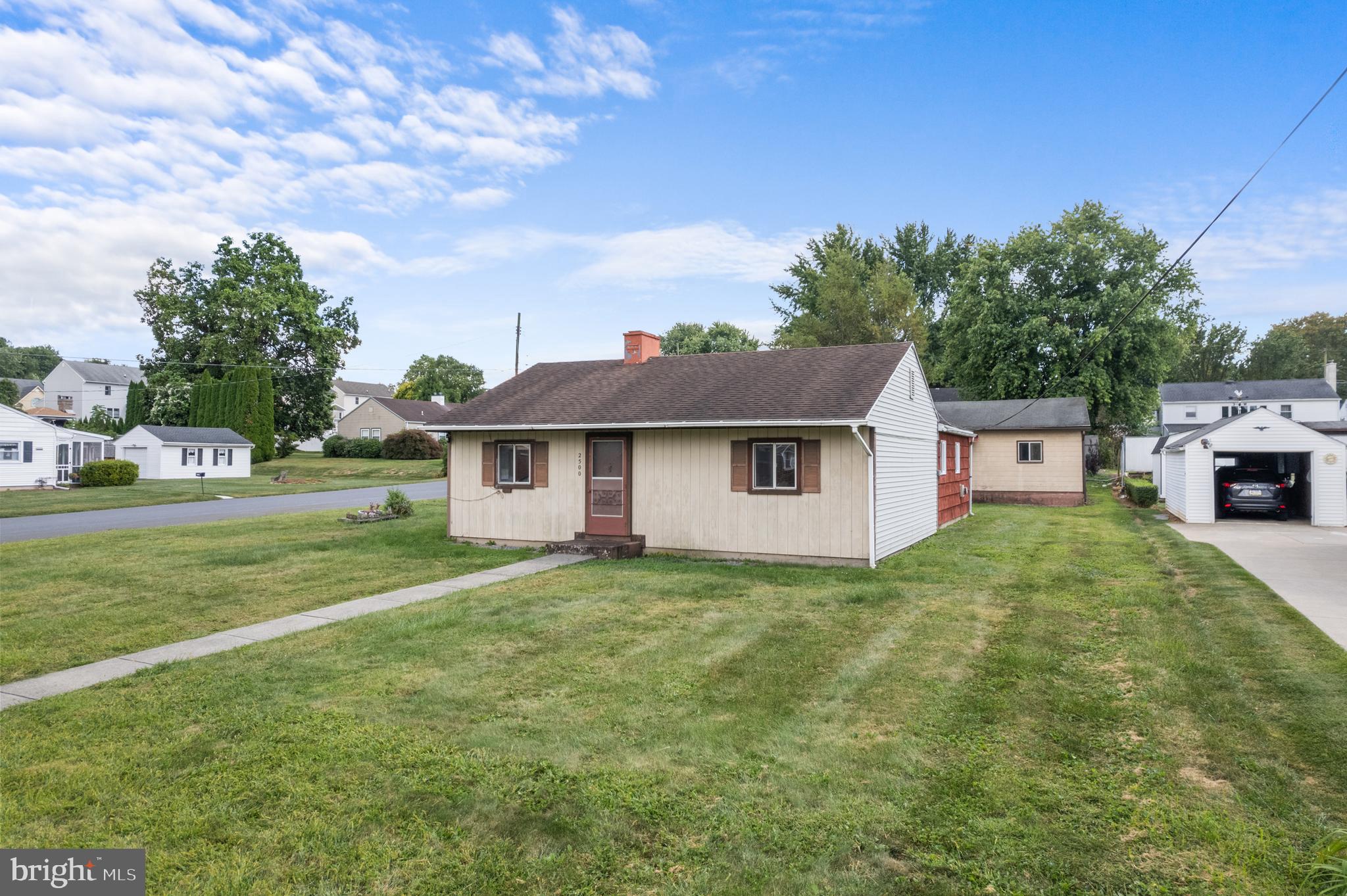 Now Available in Desirable Palmer Township! This solid 3-bedroom, 2-bath ranch home offers nearly 1,200 sq ft of functional, single-floor living on a spacious 0.25+ acre corner lot. Lovingly owned by its original owners, this home is a rare find just minutes from all major conveniences yet tucked away on a quiet street. Step into a generous living room that leads to the northwest wing featuring two bedrooms and a full bath. The southeast wing offers a bright kitchen with adjacent dining area and a centrally located laundry/utility room. A separate southwest wing includes a half bath, bonus room/home office, and a large primary bedroom with sliding doors to the private patio with Hot Tub—perfect for relaxing evenings. The oversized barn-style garage accommodates two cars with significantly ample room for storage, plus additional parking in the driveway and on-street. A storage shed adds even more flexibility. Priced to reflect its blank canvas potential, this home is ready for your personal touches. Showings begin Monday 9/8 – don't miss the Public Open House Saturday 9/13, 12–2 PM! With reasonable taxes and a Great Price, this is a fantastic opportunity in a prime location—schedule your showing today!