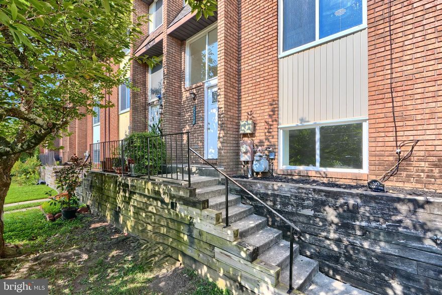 Charming 3 Bedroom, 3 Bath Townhome in Towson! This spacious home features an open-concept living and dining area, perfect for entertaining, with direct access to a private deck overlooking serene wooded views. The kitchen comes equipped with modern stainless steel appliances, ready for all your culinary needs. Upstairs, each bedroom offers built-in closets, and the primary suite includes a full bath with a shower/tub combo. The finished basement adds extra living space with a cozy den featuring beautiful wood accents and a decorative fireplace, plus a sliding door leading to a peaceful rear patio. The lower level also includes a full bath and a convenient laundry/utility area. Enjoy wood-style flooring and carpet throughout. Located just minutes from shopping, dining, and top-rated schools. Pets considered on a case-by-case basis. Proof of renter’s insurance required. **Application Instructions in Documents Section**