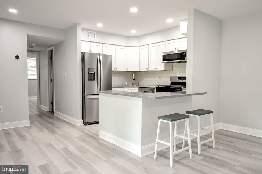 Lowest priced 2 bedroom/2 bath condo in McLean!***Step inside this completely re-imagined, totally renovated mid-century modern 2 bedroom/2 bath ground floor condo with some of the lowest Condo fees in all of McLean!  Luxury Vinyl Plank throughout, White kitchen cabinets with soft close drawers, quartz counters, SS appliances.  Modern, updated bathrooms!  New HVAC!  A+ Marshall HS pyramid!  This unit comes with 2 parking spaces and a community pool. Walk to McLean Metro, Tysons mall, Capital One complex, One-life Fitness, fine shops, restaurants and more!  Perfect as a primary residence, income producing rental property, or corporate retreat!  Plenty of parking and access to all major commuter routes!