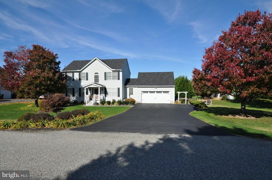 Buyers Mortgage fell thru!! HURRY! Walk to the Water" Meticulous w/ open floor plan.  Recent updates Roof, heating & A/C, custom tile master bathroom, granite in all bathrooms,hardwood fls, carpet, walk-in Pantry w/ tile. Sun-drenched morning room, numerous "Pella"windows overlooking a spectacular lot.  partially finished w/ bonus & rec rm. Stamped concrete patio front porch & carriage gamrage drs