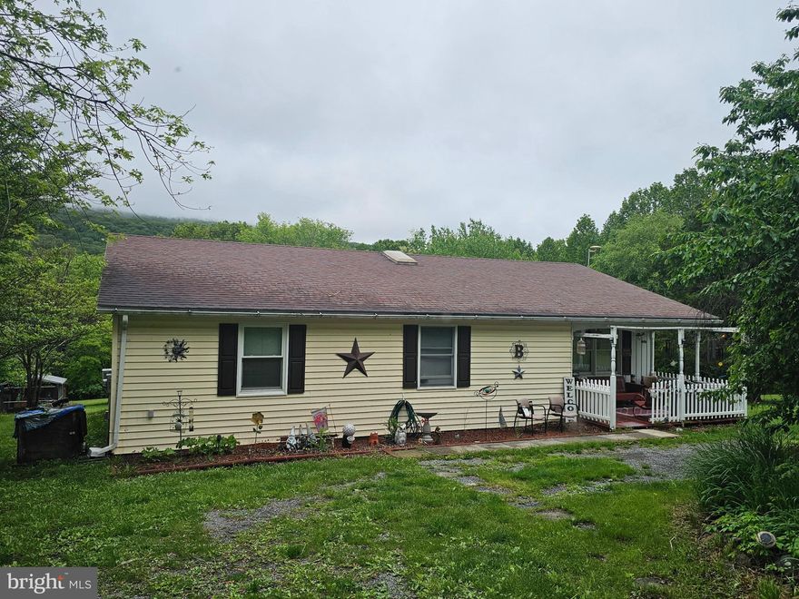 COMING SOON don't hesitate on making an appointment to see this 3-bedroom 2-bathroom rancher on 5.49 acres. This home has plenty of room for entertaining with a kitchen/dining combo which connects to the living room, family room and a 29x12 great room. Home can be one flooring living with the stacked washer/dryer on main floor and an additional washer & dryer in the unfinished basement area.  Enjoy the view from the rear deck of the mountain or the wildlife roaming in your beautiful back yard. Pets, chickens or maybe even a goat if you choose. Plenty of yard space and a fenced garden already in place. Multiple sheds for all your toys and yard equipment. Get your appointment now. Professional Photos Coming Soon