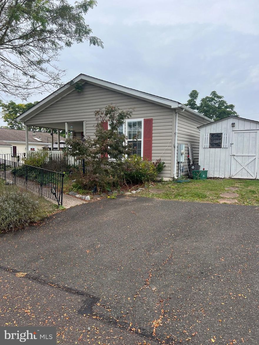 Welcome to this lovely 2-bedroom, 2-full-bath home located in a peaceful 55+ community. This inviting property features a bright and airy sunroom overlooking a tranquil pond, perfect for enjoying your morning coffee or relaxing afternoons.The home offers a spacious open layout with plenty of natural light. The primary bedroom includes an en-suite bathroom, while the second bedroom and full bath provide comfort for guests or additional living space. With a little updating, this home offers a fantastic opportunity to add your own personal touch and make it truly yours.Enjoy quiet living in a friendly neighborhood, just minutes from shopping, dining, and community amenities. As Is