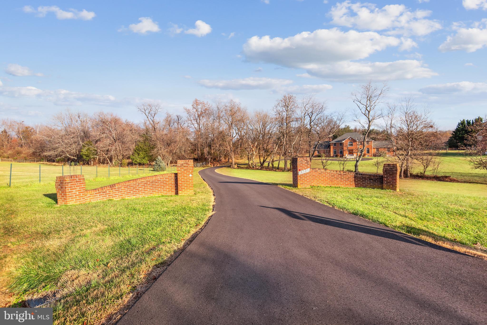 STATELY CUSTOM-BUILT 4-SIDED BRICK COLONIAL ON A PREMIUM LOT WITH 3-CAR GARAGE, 4 EN-SUITE BEDROOMS UPSTAIRS, 2 KITCHENS, AND FABULOUS UPDATES INCLUDING 2018 NEW ROOF, 2022 HOT WATER HEATER, 2023 COOKTOP, NEW GARAGE DOORS, AND REFINISHED (2023) HARDWOOD FLOORING THROUGHOUT! ELEGANTLY sited on an expansive 2.17-acre yard with picturesque views and ultimate privacy, this magnificent 4 BD, 4 Full & 2 Half BA estate boasts over 5,100 square feet of finished space with high quality construction such as 2 x 6 planks for structure, double Insulation on roof/attic, R31 insulation, and windows with aluminum exterior frame and wood inside.
Gorgeous crown dentil moldings in the formal living & dining rooms, grand 2-story foyer with a circular staircase, and open and inviting entertainment spaces are featured on the MAIN LEVEL. The gourmet island kitchen is a chef’s delight showcasing a breakfast area, all stainless-steel appliances including a brand new 2023 cooktop, quartz countertops, and a nice surprise - an adjacent second kitchen with a new 2023 stove/range, accessing to a laundry room! Architectural details delight the eye in the dramatic and light-filled 2-story vaulted family room with a brick wood-burning fireplace adjacent to the home office.
UPPER LEVEL l highlights include the large well-appointed Owner’s bedroom suite and spa-style bathroom with a Jacuzzi tub and a large walk-in shower stall. Three additional bedrooms and 3 bathrooms complete the second floor. Stepping down to the LOWER LEVEL is an expansive recreation/billiards room, powder room #2, an unfinished bonus room and an enormous storage room or ideal as a future media room. Enjoy outdoor activities on the spacious backyard complete with a storage shed. You’ll love the location near parks, shopping, and access to the famous Glenstone Museum, all this within the nationally top-ranked Wootton High School disctrict. A perfect gem!