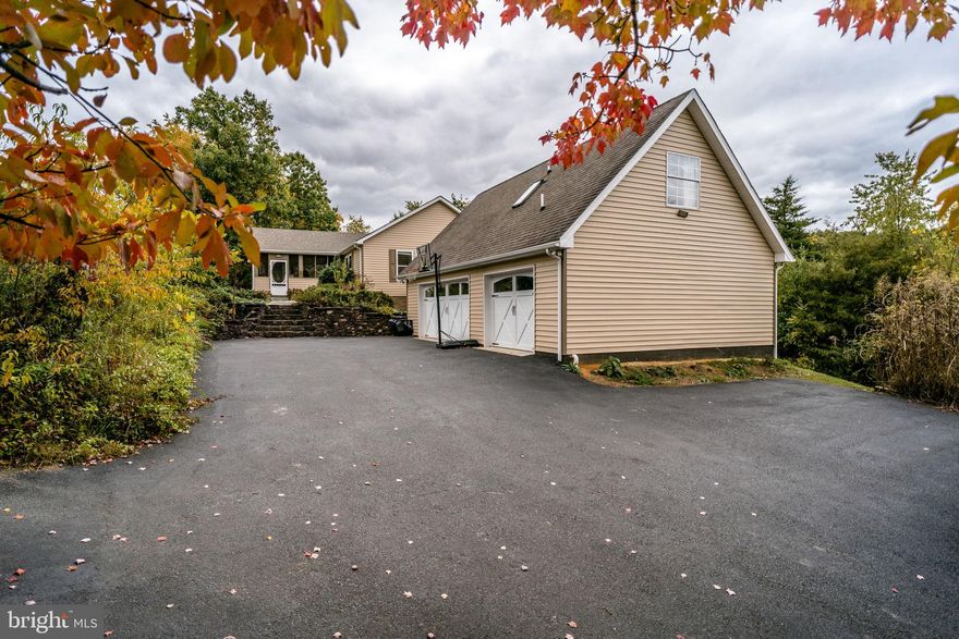 A perfect house for your family! Own magnificent mountain views and be only 2 minutes from Staunton. This 4-bedroom 4 bath house with private professional rock landscape, an outside hot tub, and a saltwater pool is what you have been looking for. There is a kitchen with plenty of counter space, ceramic backsplash and a center island, a covered porch, a sunroom and an apartment over the garage that can be used as an office, game or family room. Detached 3 car garage provides plenty of storage. Above mentioned property #054 6A is situated on around 4.83 acres, there will be 5 additional acres in the back that will be surveyed and subdivided from lot 054 6D for a total acreage of around 9.83 acres and are included in sales price.  Currently property is in land use.