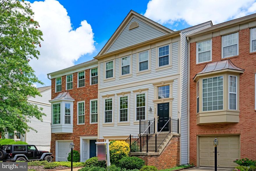 Don’t wait and miss your happy place!  Hurry and see this spacious, smartly modernized three bedroom two and a half bath town home located in the sought-after neighborhood of Island Creek. Upon entering, you'll experience an open concept living and dining room leading to the spacious kitchen where your family and friends will love to gather around the center island with bar-style seating. Plenty of additional space can be allocated for eat-in or entertaining with walkout to your upper deck. There are too many updates to mention, but some of the biggest ones include a new roof in 2020, new windows and blinds, newer stainless-steel appliances, hardwood and parquet flooring, wainscoting, crown molding, updated light fixtures, HVAC system replaced in 2012, fresh paint throughout and much more. Enjoy the updated kitchen with 42-inch oak cabinets, black pearl granite counter tops w/tumbled marble backsplash, breakfast/entertaining area, walkout deck and tons of natural light. The main level features gleaming hardwood floors, an open concept/airy living and dining room.  Upstairs you will find beautiful parquet flooring throughout, two guest rooms w/spacious closets, guest bathroom and a large master bedroom with private en-suite and walk-in closet. The master showcases a vaulted ceiling w/planter shelf, wainscoting, closet shelving, fresh paint, and large storage area in attic. On the lower level, you will find a large laundry room with storage cabinets, a recreation/family room with a wood burning fireplace, under staircase storage and a storage room with rough-ins for an additional full bathroom. The one car garage features built-in storage shelving, drop-down racks, and a bonus cut-out for more stowage (hang your bikes!) or a work bench.  Additionally, the lower deck will provide generous space for outside entertaining, another grill, and direct access to green space. Attached one car garage with parking for one more in driveway.  Guest parking is directly in front of house! Community features pool, walking trails, club house, playgrounds, tennis and basketball courts. Walk to Hilltop Village which include Wegmans, LA Fitness, several restaurants and more.  Within walking distance to the Franconia-Springfield metro and conveniently located a short drive or walk to the Kingstowne Town Center, Ft Belvoir and I-495/95 (+HOV) and the Fairfax County Parkway. Welcome home!