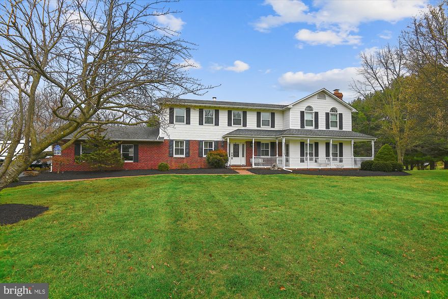 Welcome Home!!  For your consideration, this 4800+ sq ft sprawling colonial with space galore, a 2.92 acre lot, a large three bay detached garage, above ground swimming pool, , fire pit and seating area, large rear deck and gaga pit!  Family fun at its finest!   This beautiful, quality home boasts a 2 story family room with brick fireplace, cathedral ceiling and loft, formal dining room , updated kitchen with breakfast nook and an exquisite sun room with peaceful, calming views, sure to be your favorite room in your new home!  .4 spacious bedrooms with ample closet and storage space, the primary bedroom includes a bath with jetted soaking tub!  There's an exercise room and additional rec area in the finished basement.  Seller improvements include:  2015 new septic system;  installed radon mitigation system;  owned propane tank 
2016 – Renovated Basement – (floors and painted walls)   2018 -  Replacement Windows (13) ; Plantation Shutters (5); Purchased Stove  2019 -  Replaced Well Pump; Remodeled Powder Room; Renovated Deck; , Sealed Driveway  2020 – Asphalted 2nd Driveway (previously gravel)   2021 -  Replaced Water Heater, Dishwasher, Skylight Windows (2); Cleaned Septic, Sealed Driveway 2022 – Painted interior (1st and 2nd floors);  Replaced Dryer.  A must see!