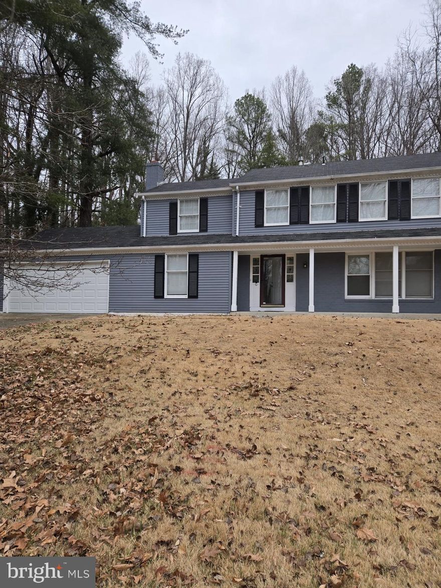 Fully Renovated & Move-In Ready! This stunning 4-bedroom, 2.5-bath single-family home has been completely updated inside and out. Enjoy an updated kitchen, luxury vinyl flooring on the main level, plush carpet upstairs, a cozy family room with a fireplace, separate living and dining room and a fully finished basement. The kitchen shines with brand new stainless appliances, fresh countertops and new flooring. Enjoy the finished basement with a large 5th bedroom/office space and large living area that provides additional entertainment/living space. Serene forest views with an oversized deck leading to a spacious backyard is perfect for entertaining. A two-car garage adds convenience. Located in a sought-after area with quick access to downtown DC, National Harbor, Andrews AFB, Waldorf, Metro, and major highways.