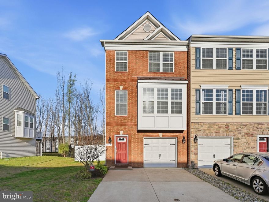 Spacious 3 BR, 2 full and 2 half bath end-unit townhome with over 1900sq ft of living space in amenity-rich Rappahannock Landing. Hardwood floors span the entire light-filled main level. A well-appointed kitchen features tons of cabinetry with under-cabinet lighting, granite counters,  gas cooking, and a large pantry.  On the upper level, you'll find a large Primary bedroom with a vaulted ceiling,  walk-in closet and a four-piece ensuite. Two additional ample-sized bedrooms with ceiling fans, another full bath, and a laundry center complete the upper level. The walk-out lower-level features a large recreation room and another half bath. The fenced yard is larger than most of the units, and backs to green space for additional privacy.  The location is unbeatable: minutes to Downtown Fredericksburg, shopping, dining and parks with miles of walking trails. Easy commuter options include two VRE stations and I-95 access within a 10 minute drive.