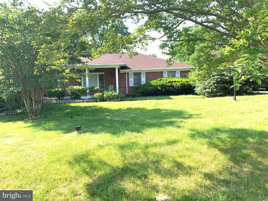Paradise Acres in Bowie Amazing all Brick Rambler ,Gorgeous Manicured Yard Mature Crape Myrtle Trees Walk out basement  with Large Flat Yard .Separate Living Room and Dining Room with Back to Back Fireplaces Eat-In Kitchen single level living at its finest. Conveniently located between Kettering and Woodmore  off Enterprise Rd  in Bowie Md. Short Commute to Metro District of Columbia Northern Va. National Harbor  495/95 and all the DMV has to offer Many recent upgrades include Newly Shingled Roof and New HVAC system. Beautifully furnished and finished 4000 square ft. of living space Attached 2-Car Garage No HOA Excellent opportunity to   Paradise Acres your personal Paradise
