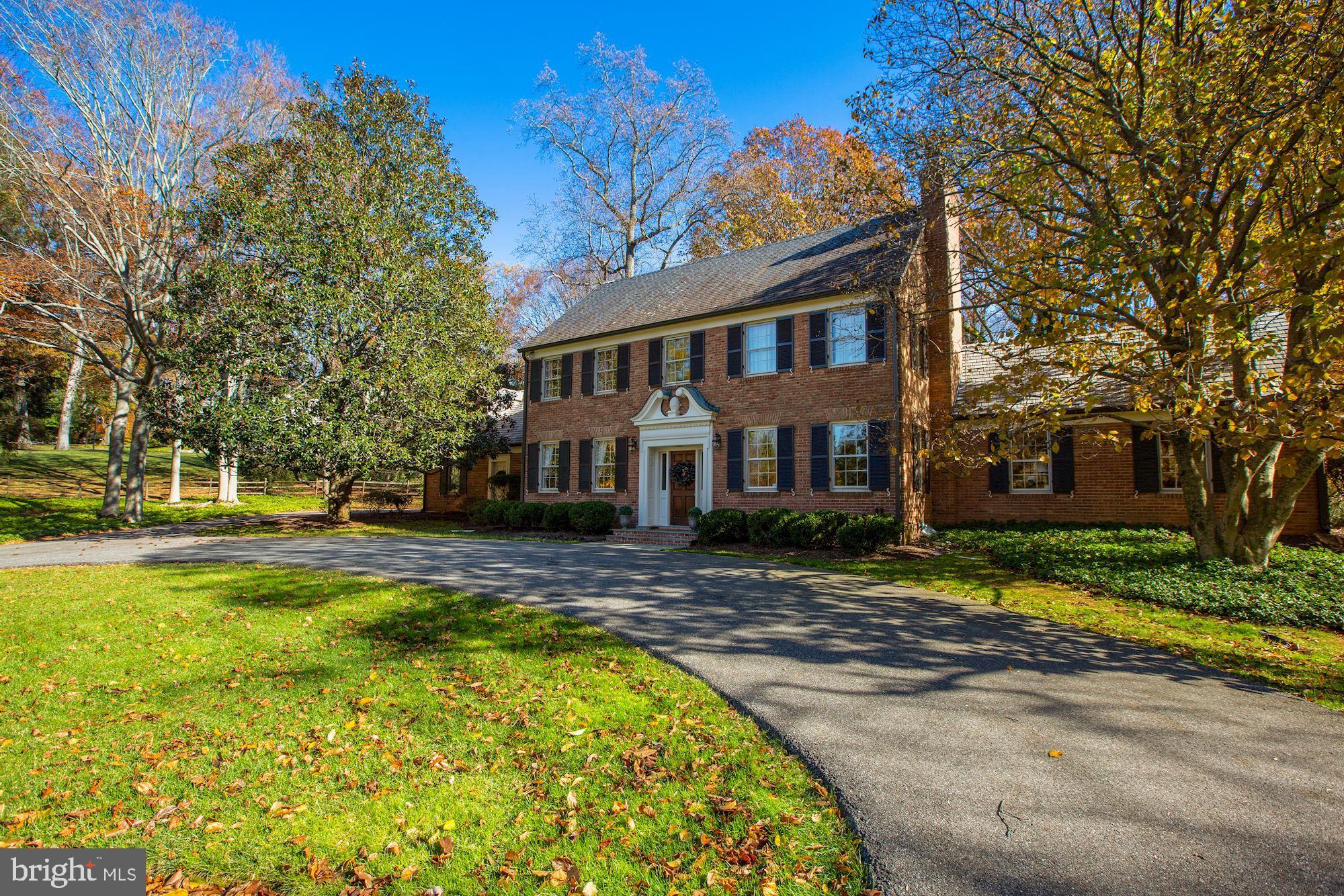 Wow! a SEVEN bedroom home in Potomac Falls. This stately 4 level, brick colonial sits on 2+ acres, on a quiet, tree lined cul-de-sac.
The main level is light filled and offers: a living room with gas fireplace, well sized dining room, a kitchen which opens into a spacious breakfast room which in turn opens into the family room which walks out to the flat backyard, patio and pool. A beautiful home office/library/sun room with gas FP and 3 sides of windows which bring in natural light rounds out the main level.
First upper level boasts 5 bedrooms and 4 full bathrooms. Main BR offers en suite full bath and loads of closet space. All bedrooms are well sized. Two bedrooms are adjoined by a buddy bath and two have en-suite full baths.
Second upper level boasts 2 bedrooms and one full bath. This area can be bedrooms, play area or home office space. Access to attic storage
The lower level is unfinished but it has a 9' feet ceiling height, workshop area , half bath and stairs which walk up to back yard. It's waiting for you to finish off the way you want it to be!