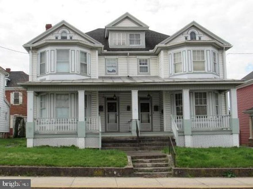 Are you a visionary with an eye for potential? Step into the charm of yesteryears with this stunning Victorian duplex waiting to be transformed into your dream home or investment property! 6 bedrooms; 2 full baths and 2 half baths nestled in historic Martinsburg.  The Duplex Layout offers the versatility of two separate units- perfect for multi-generational living, rental income, or conversion into a single-family home.  Character abounds with original hardwood floors and decorative moldings. Unleash your creativity and design flair to transform this blank canvas into a masterpiece, with endless possibilities for modern updates and customization.  The large back yard with 3 car garage borders an ally for easy off-street parking.   Customize and create a space that reflects your style and preferences, tailored to your needs and aspirations.  The former owner lived in one said and had her business in the other! Whether you're a seasoned renovator, aspiring homeowner, or savvy investor, this property promises endless potential and a rewarding journey ahead. Contact us today to schedule a viewing and embark on your journey to transform this Victorian duplex into the home of your dreams!